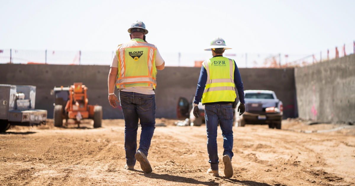 Foreman and laborer on a jobsite