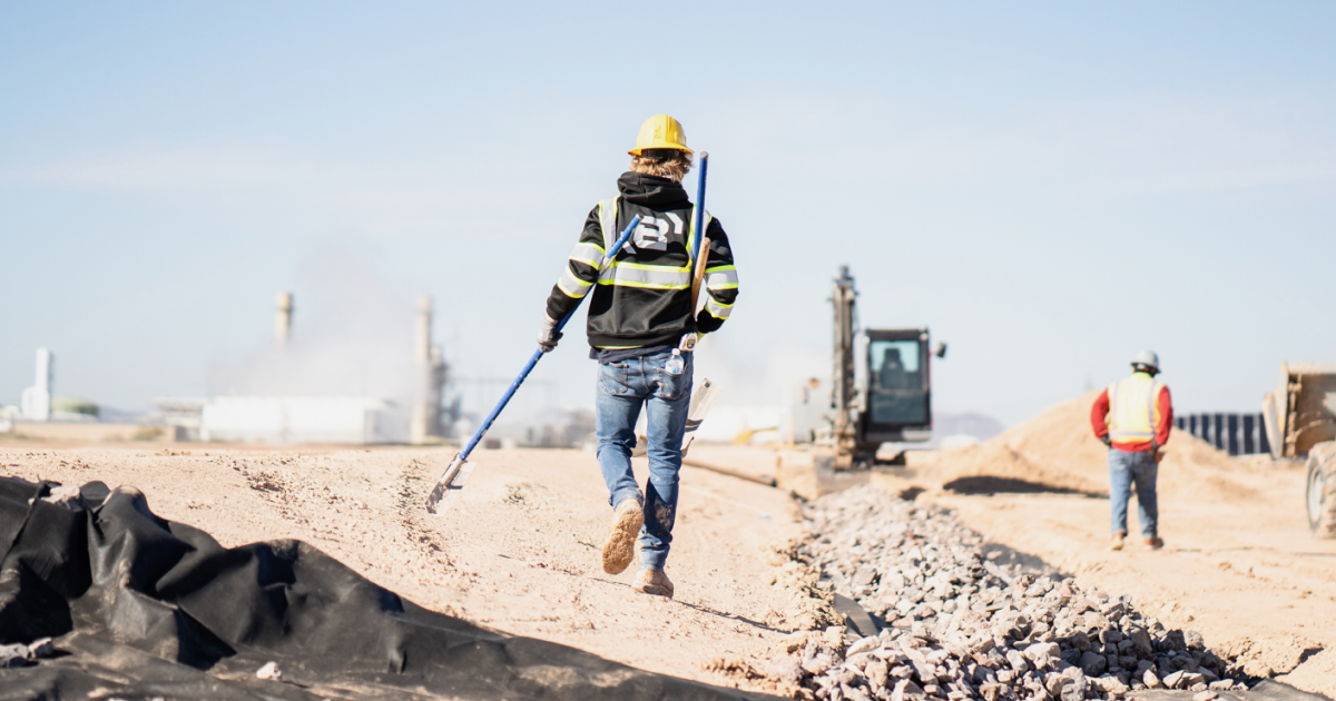 Construction worker walking across a jobsite