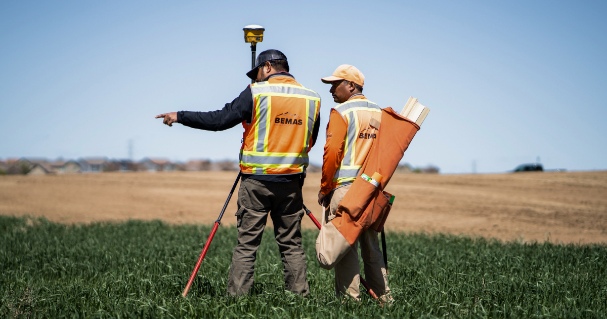 Surveyors at work on a jobsite