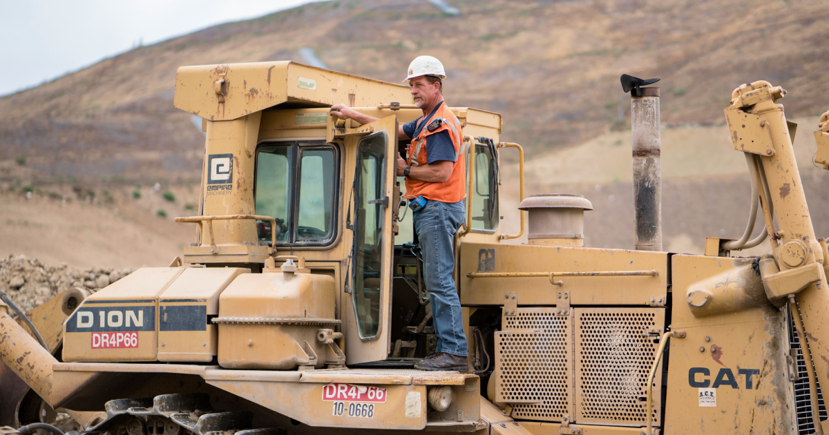 Operator entering a tractor