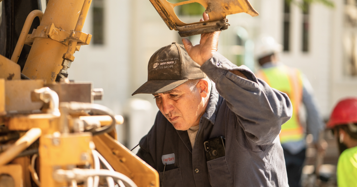 Worker looking at a machine